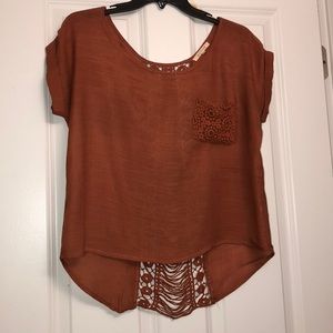 Orange top with knitted back